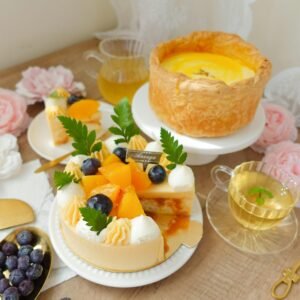 A mouthwatering display of cheesecake with fresh fruits, perfect for dessert or tea time.